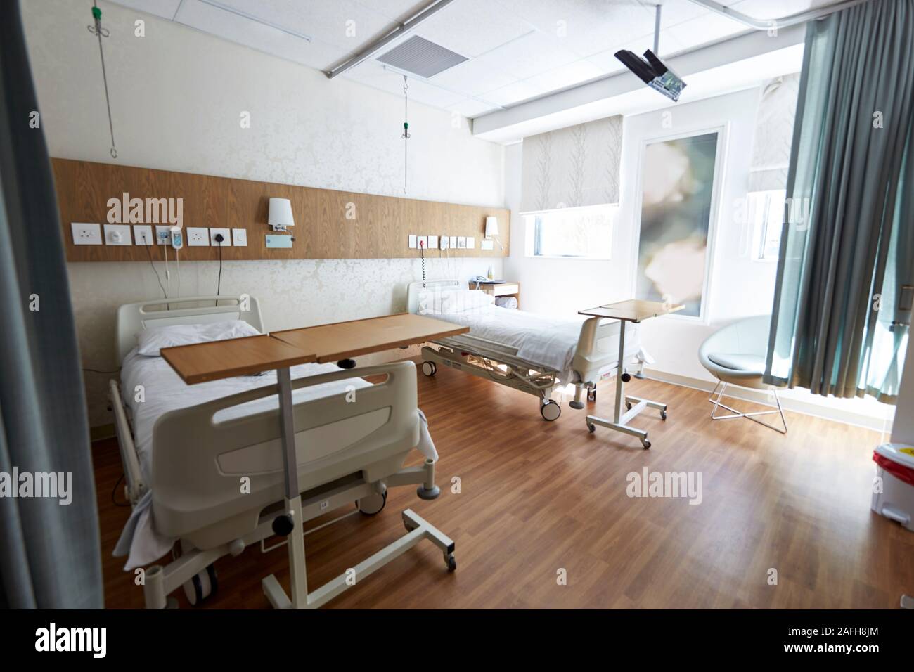 Beds In Empty Hospital Ward Stock Photo