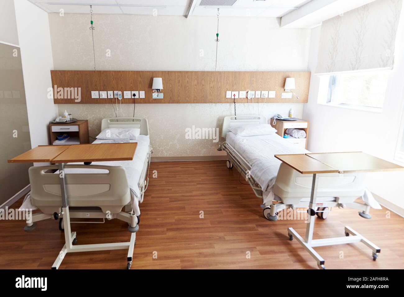 Beds In Empty Hospital Ward Stock Photo