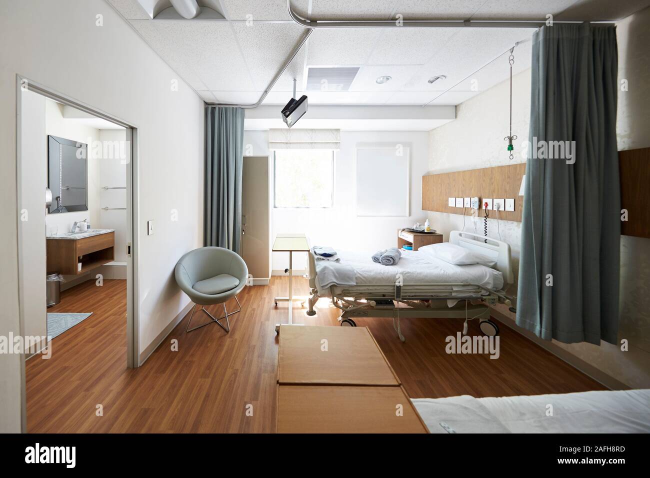 Beds In Empty Hospital Ward Stock Photo