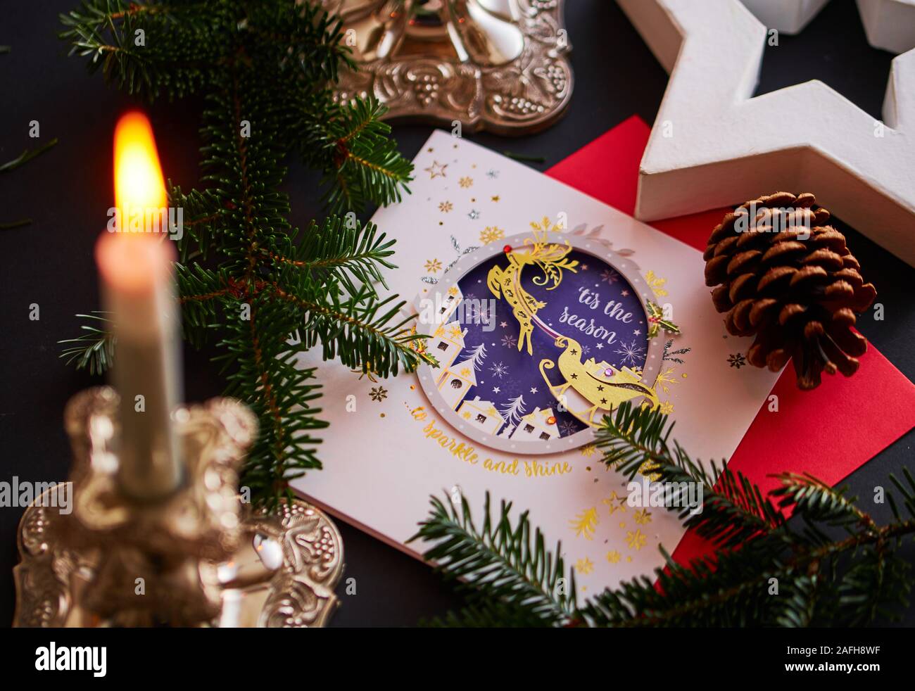Christmas Card With Flaming Candles In A Vintage Silver Candleholders Stock Photo Alamy