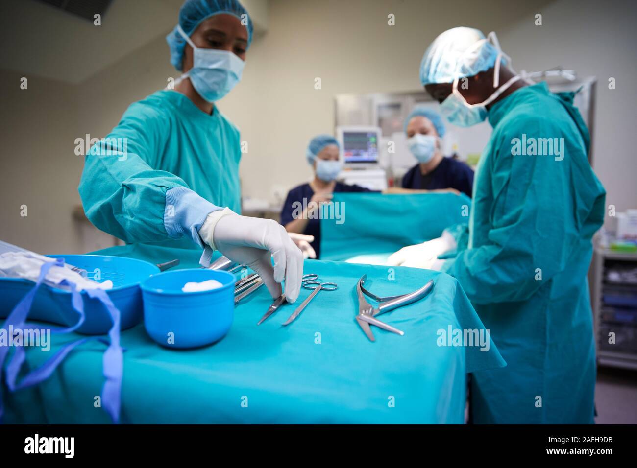 Surgical Team Working On Patient In Hospital Operating Theatre Stock ...