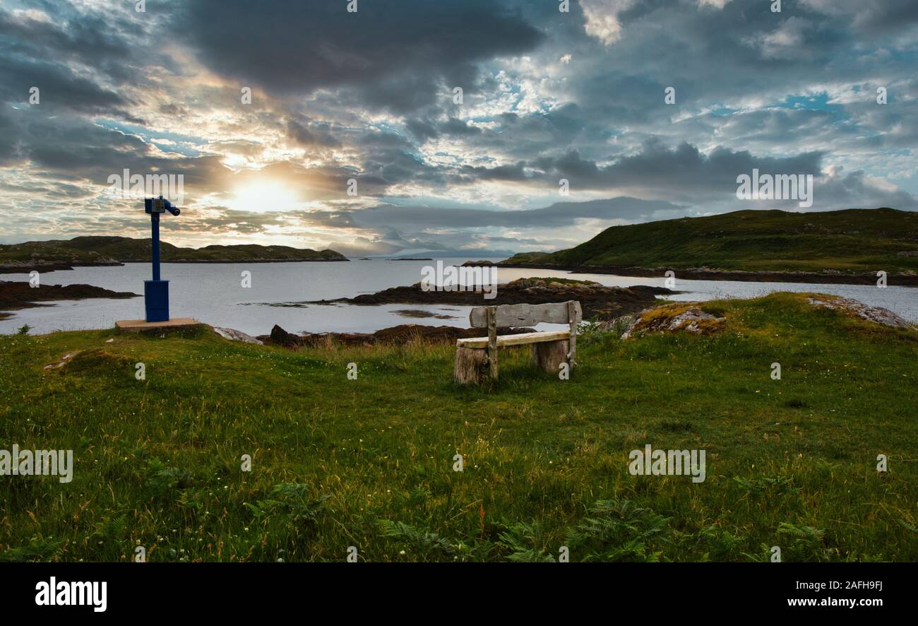 Coin operated telescope by the Atlantic Ocean on the coast of Isle of Harris, Outer Hebrides, Scotland Stock Photo