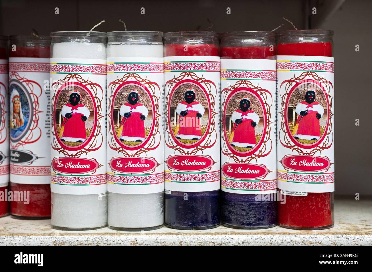 Spiritual religious scented candles for sale at Candalaria Botanica, a