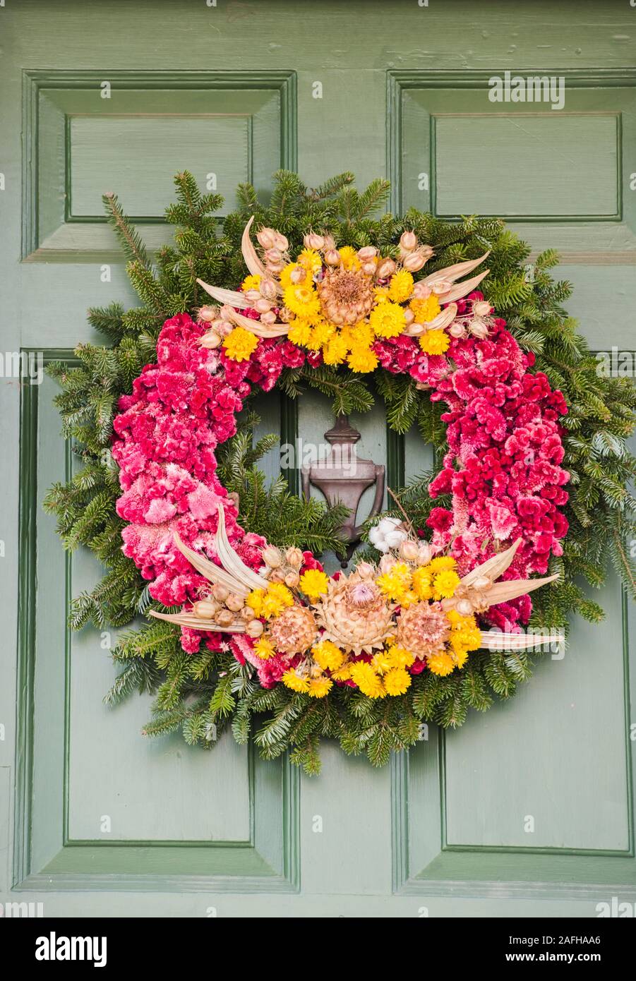Holiday wreath on green door in Colonial Wiliamsburg, Virginia