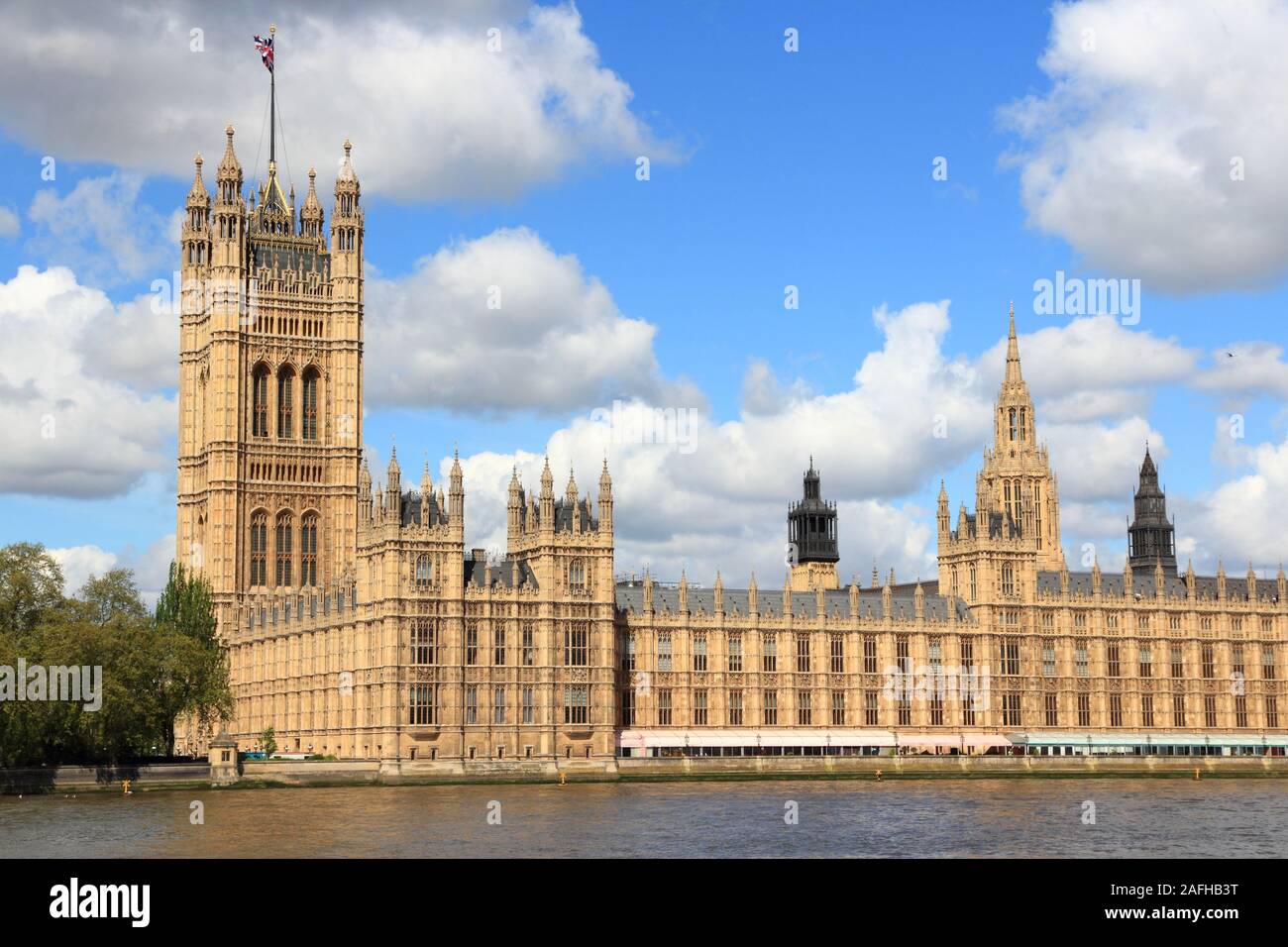 London UK - Palace of Westminster (Houses of Parliament) with Victoria tower. UNESCO World Heritage Site. Stock Photo
