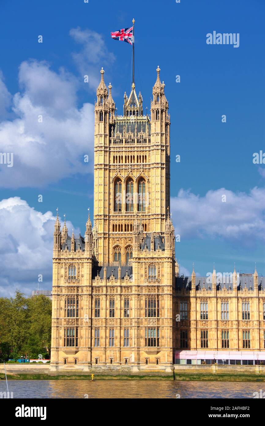 London UK - Palace of Westminster (Houses of Parliament) with Victoria tower. UNESCO World Heritage Site. Stock Photo