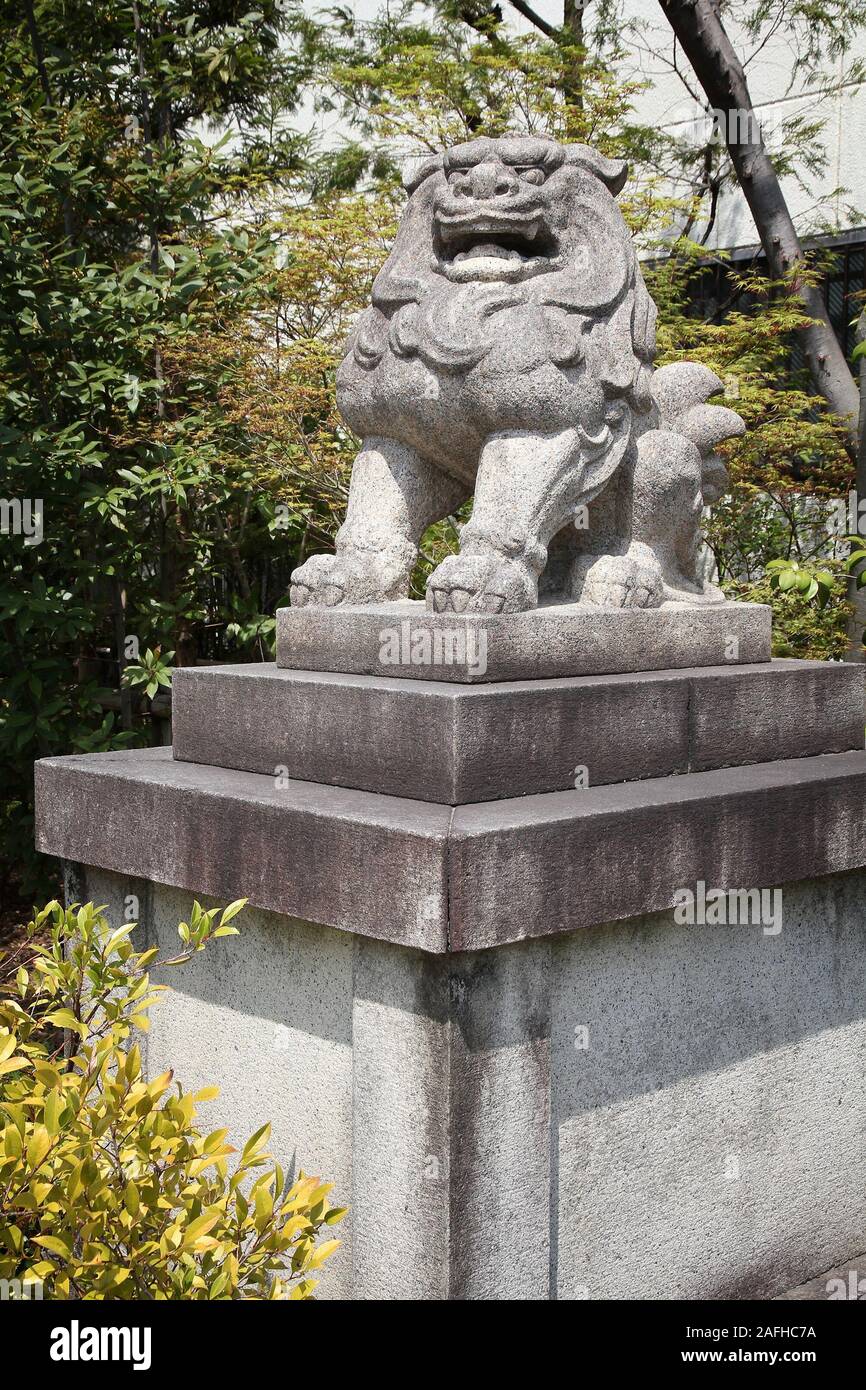 Komainu statue in Kyoto, Japan. The liondog statues are often