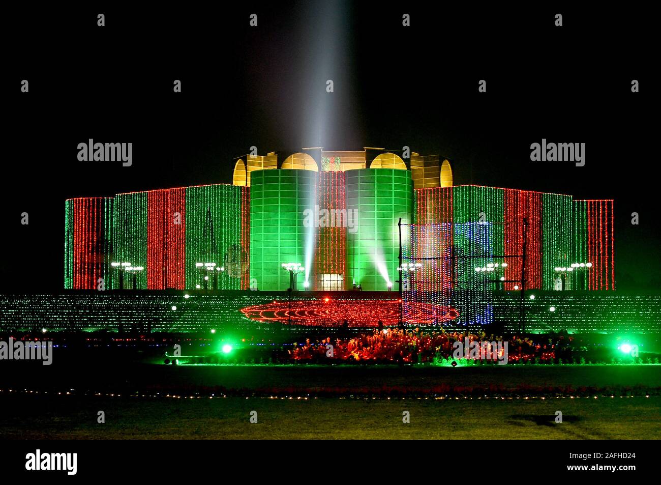 Dhaka. 15th Dec, 2019. Bangladesh's Parliament building is illuminated with lights in Dhaka, Bangladesh, Dec. 15, 2019, on the eve of the 49th victory day. Bangladesh on Monday celebrated its 49th victory day with due solemnity and rich tributes paid to the martyrs of the Liberation War of 1971. Credit: Str/Xinhua/Alamy Live News Stock Photo