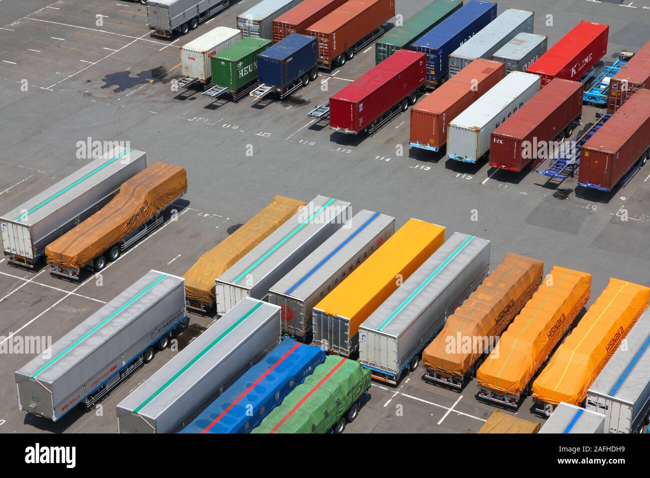 Japanese Container Line TOKYO, JAPAN - MAY 11, 2012: Containers in Port of Tokyo in Tokyo. Port ...