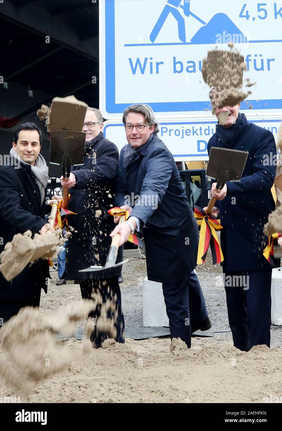 Duisburg, Germany. 16th Dec, 2019. Mahmut Özdemir (SPD), member of the Bundestag, Hendrick Schulte, NRW State Secretary, Andreas Scheuer (CSU), Federal Minister of Transport, and Hendrik Wüst (CDU), NRW Minister of Transport, are taking part in the ground-breaking ceremony for the new A40 bridge over the Rhine. The new bridge is scheduled to go into operation in 2026. Credit: Roland Weihrauch/dpa/Alamy Live News Stock Photo