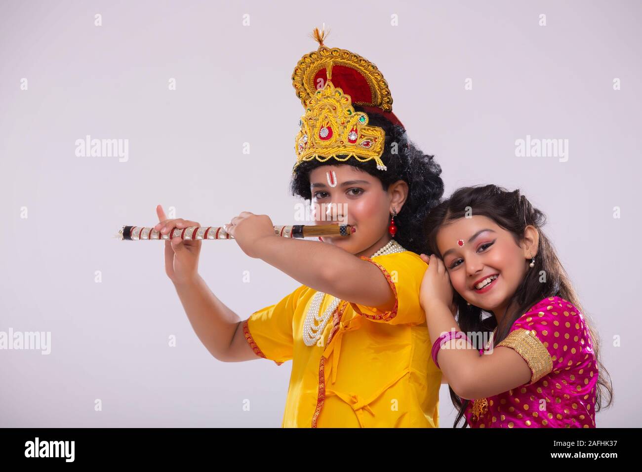 young children dressed as Radha and Krishna Stock Photo