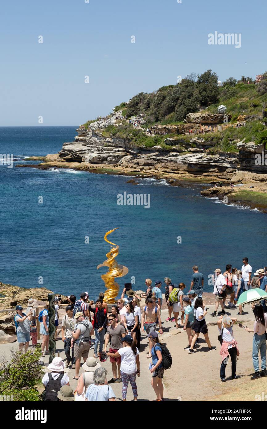 People walking on the Bondi Sculpture by the Sea walk from Bondi to Tamarama beaches, Sydney Australia Stock Photo