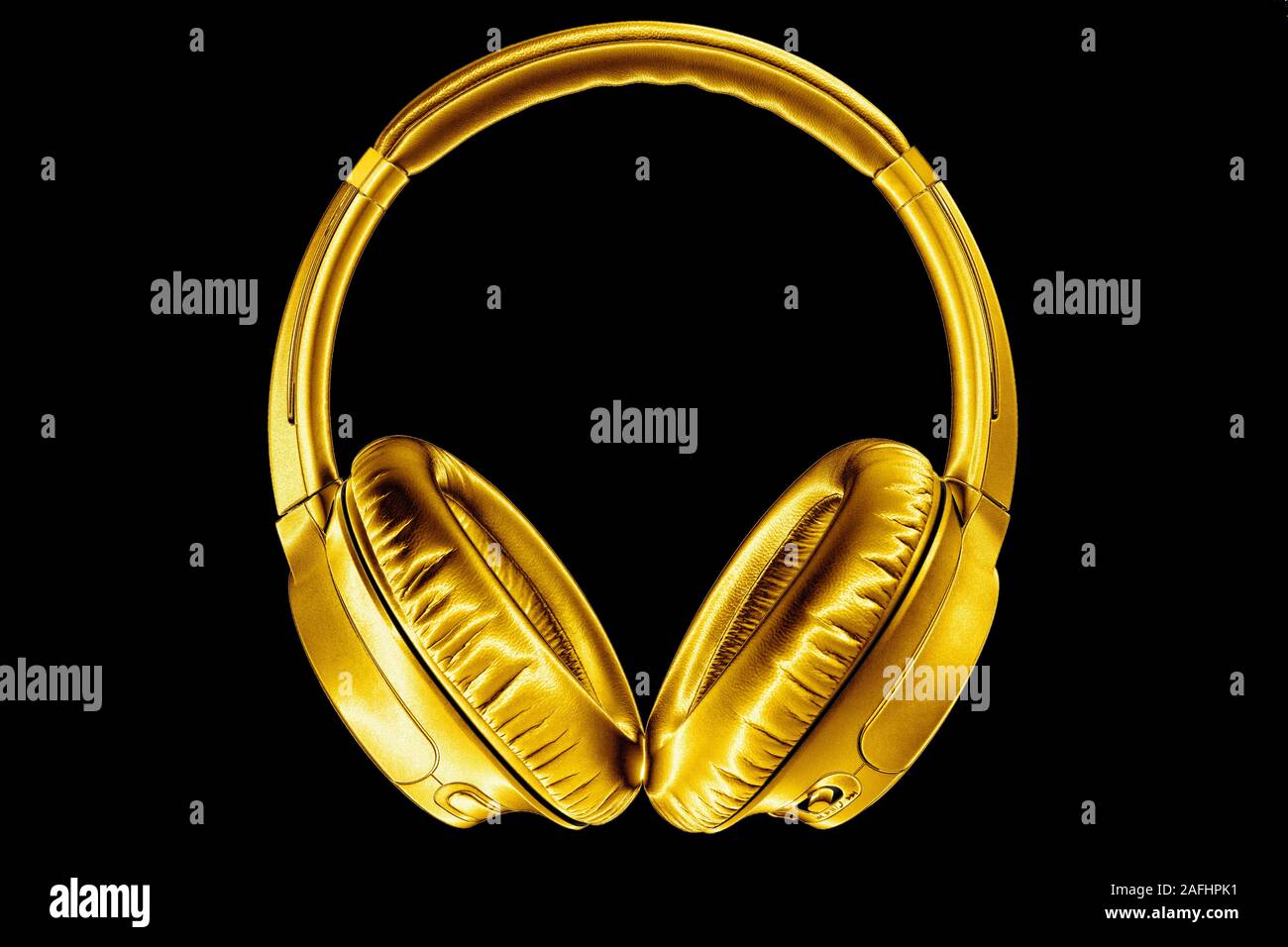 Golden shiny wireless headphones on black background isolated closeup,  expensive gold metal bluetooth headset, modern high end wi-fi yellow  earphones Stock Photo - Alamy