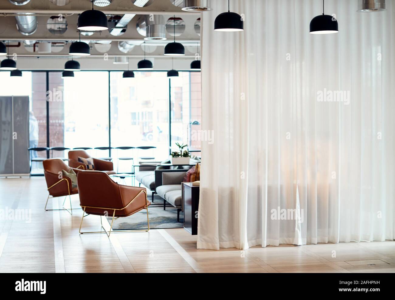 Empty Reception Area In Modern Open Plan Office Stock Photo