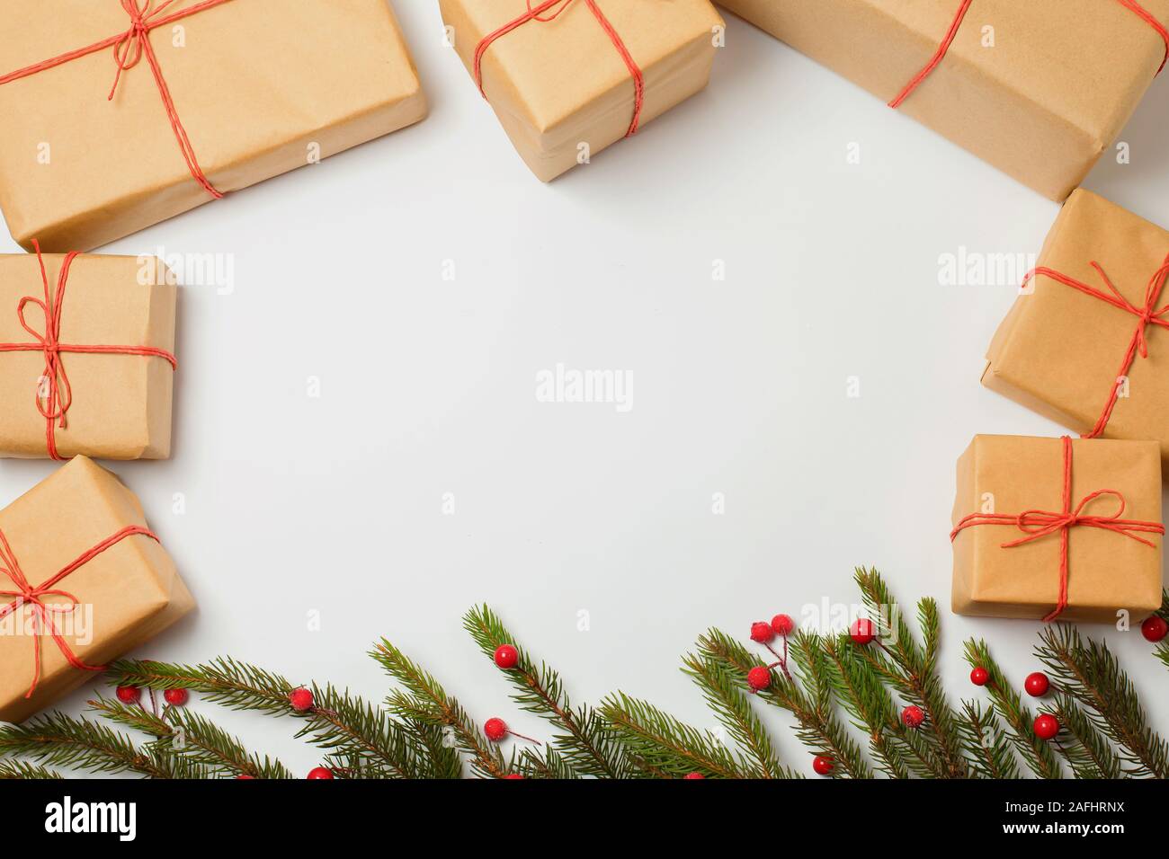 Christmas gift boxes and christmas tree on white background Stock Photo ...