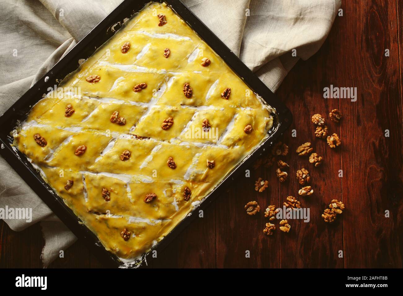 Homemade baklava with pistachios and hazelnuts and honey syrup Stock