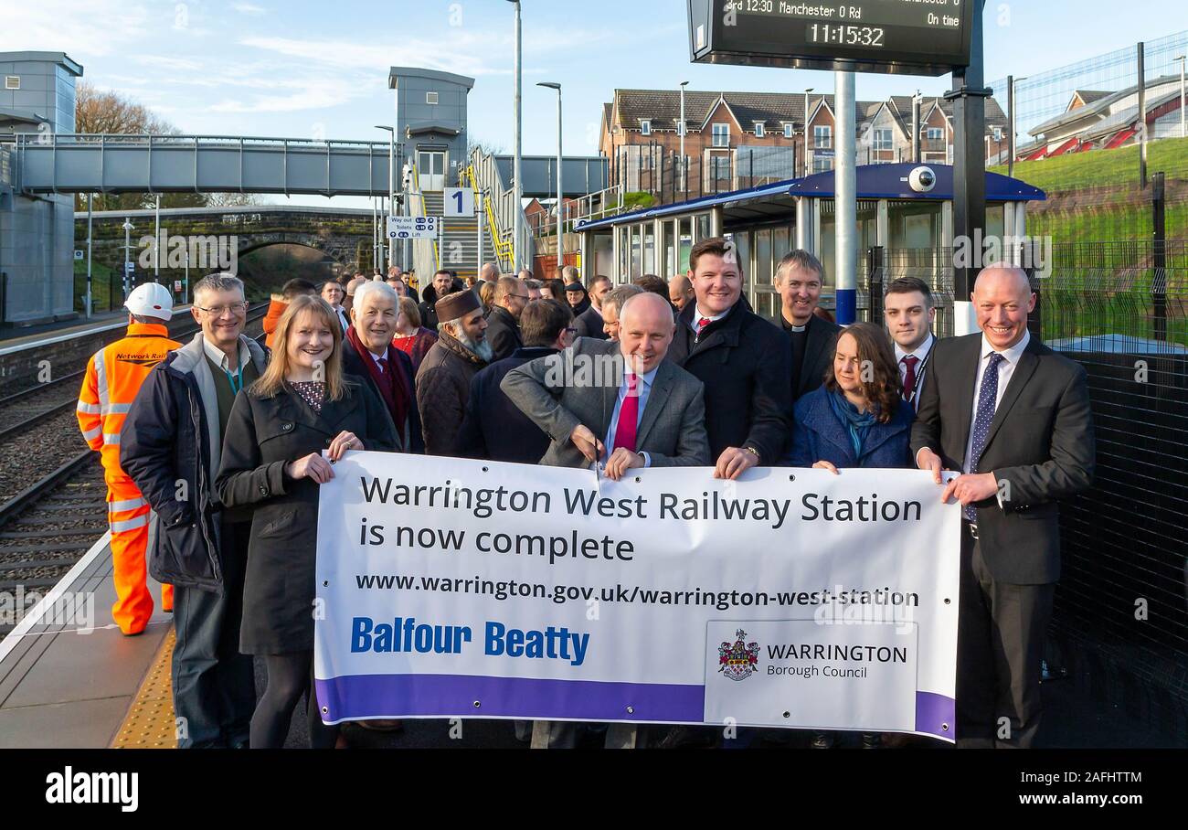 Warrington, Cheshire, UK. 16th Dec, 2019. The official opening of Warrington West Railway Station. Dignitaries hold a banner on the platform of Warrington West Railway Station, Chapelford, Warrington, Cheshire, England Credit: John Hopkins/Alamy Live News Credit: John Hopkins/Alamy Live News Stock Photo