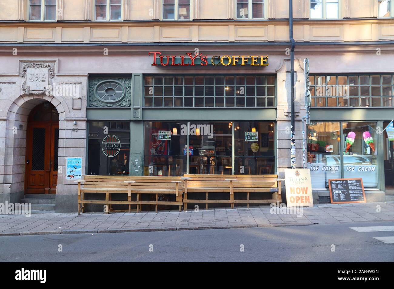 STOCKHOLM, SWEDEN - AUGUST 24, 2018: Tully's Coffee in Gotgatan street of Sodermalm district, Stockholm. Gotgatan is one of most recognizable streets Stock Photo