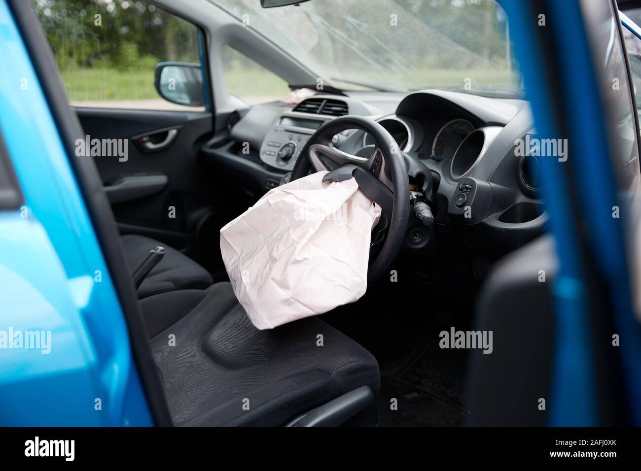 Interior Of Car After Accident With Safety Airbag Deployed Stock Photo