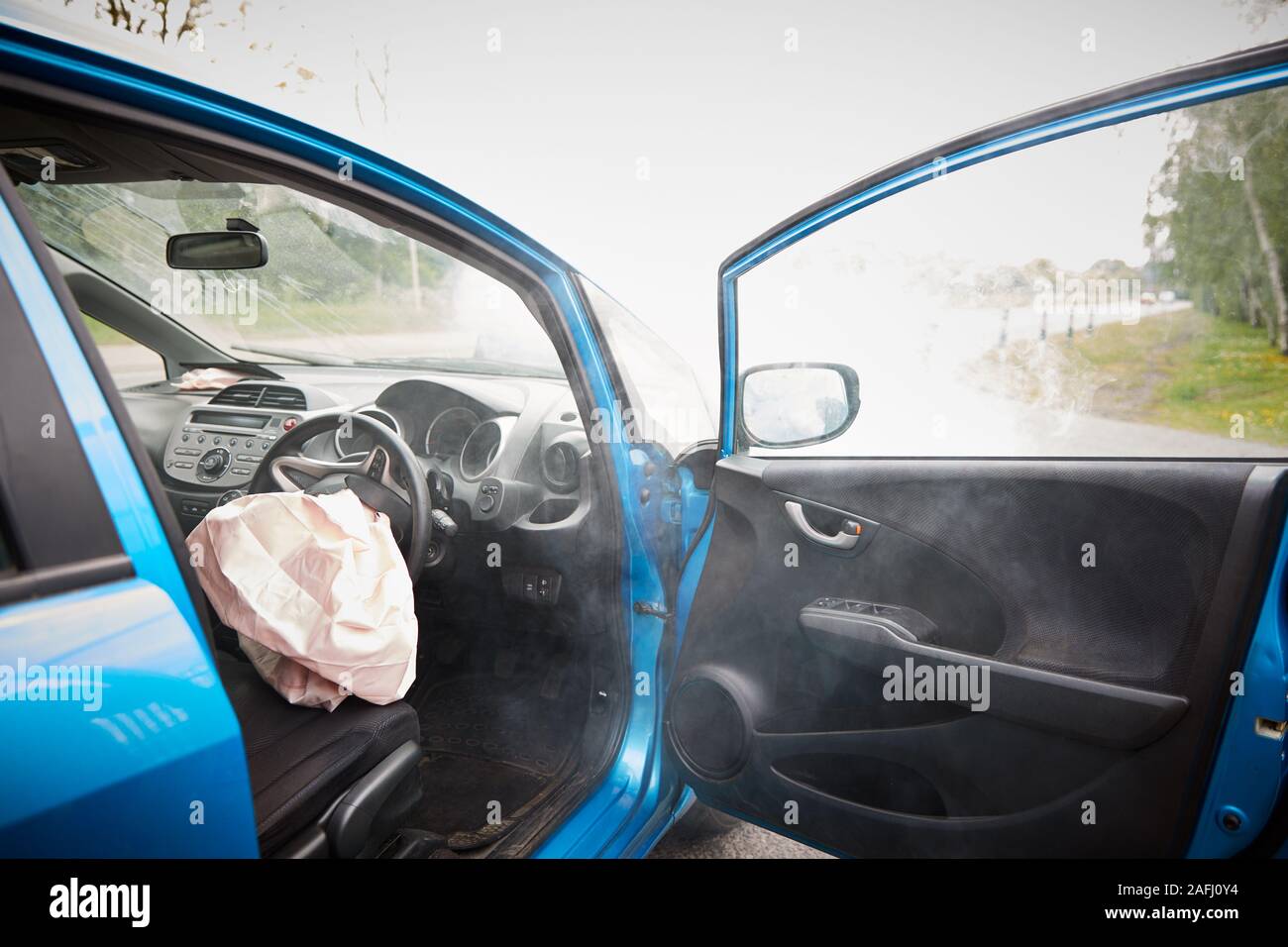 Interior Of Car After Accident With Safety Airbag Deployed Stock Photo
