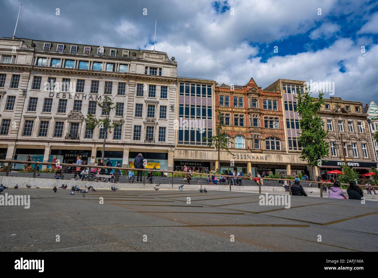 NOTTINGHAM, UNITED KINGDOM - AUGUST 15: This is a view of city buildings and shops at the Old Market Square, a popular travel destintion on August 15, Stock Photo