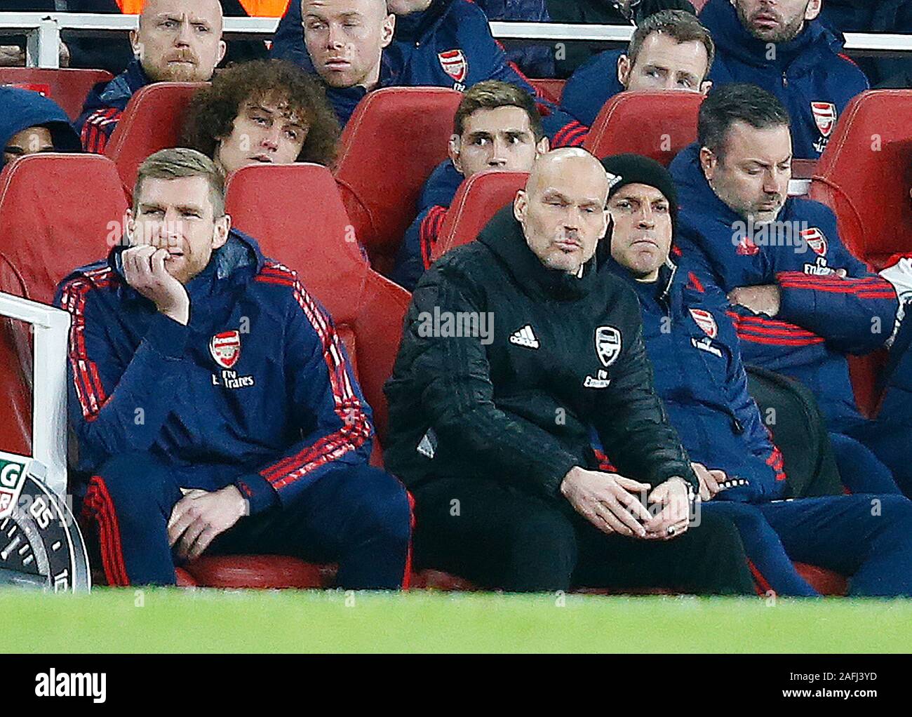LONDON, United Kingdom, DECEMBER 15.L-R Interim First-team Assistant Head Coach Per Mertesacker, Interim Head Coach Freddie Ljungberg and Steve Bould (Black Hat) during English Premier League between Arsenal and Manchester City at Emirates stadium, London, England on 15 December 2019. (Photo by AFS/Espa-Images) Stock Photo