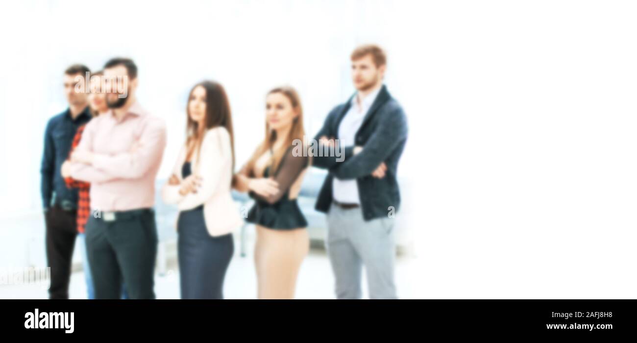 blurred image for the advertising text. photo with copy space. confident business team standing in the office Stock Photo