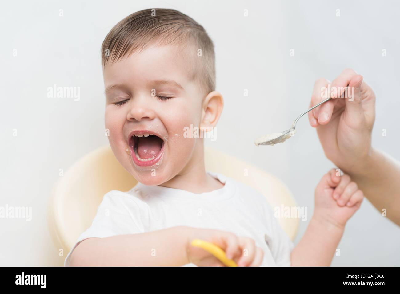 Naughty baby with mom hires stock photography and images Alamy