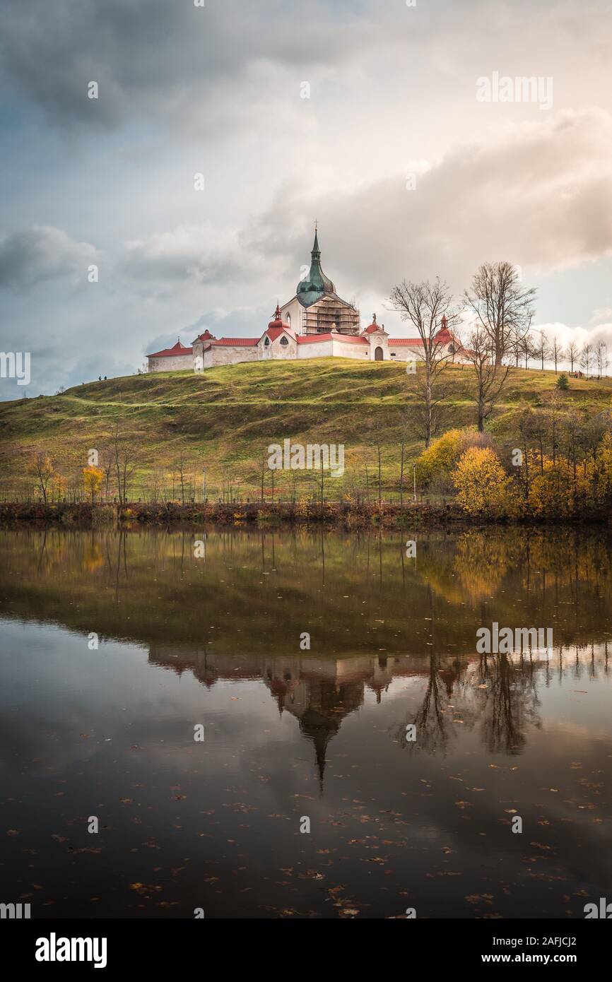 The pilgrimag church on Zelena Hora - Green Hill - Monument UNESCO. St. Jan Nepomucky Church panorama in autumn scene with reflection in the lake Stock Photo