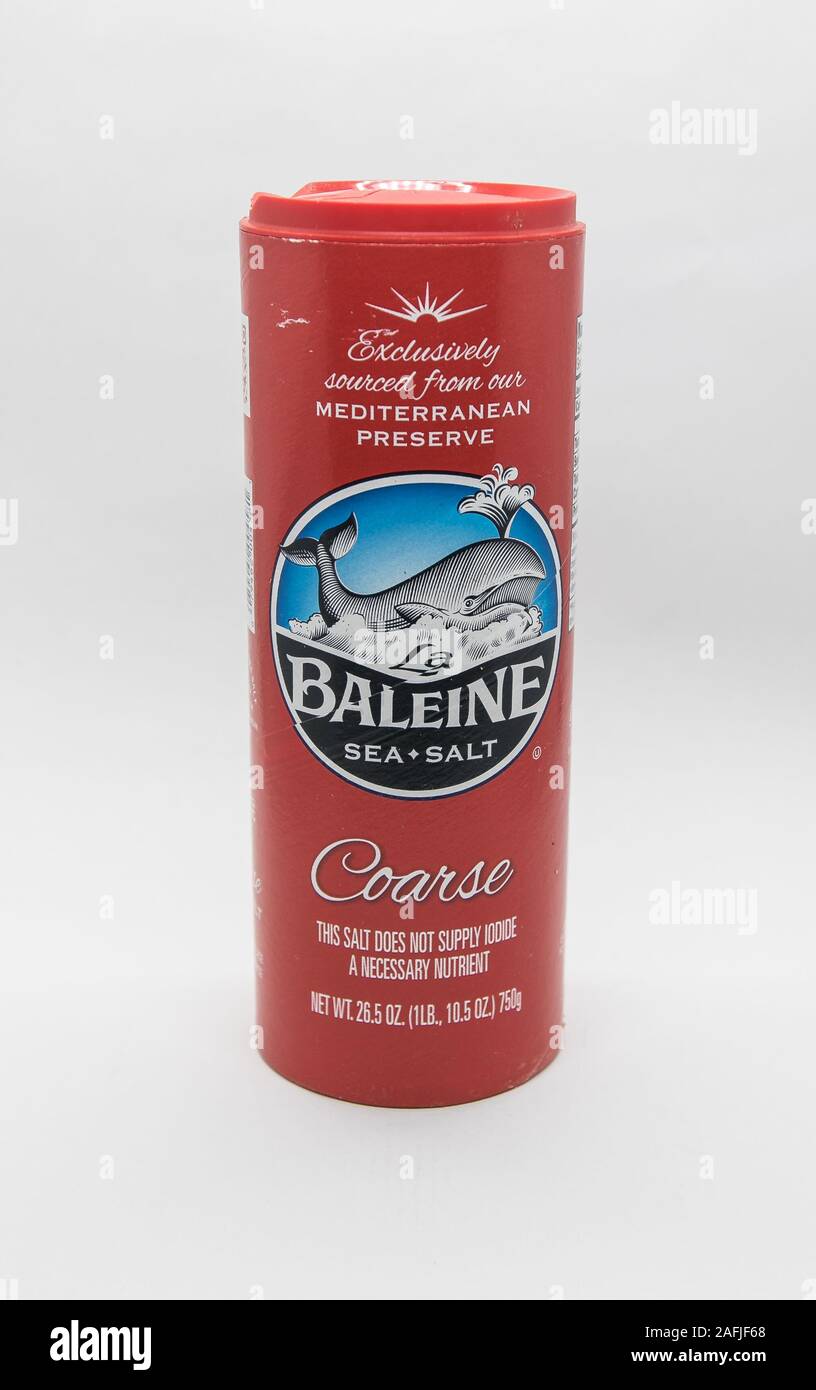 New York, 12/8/2019: Package of La Baleine coarse sea salt stands against white background. Stock Photo