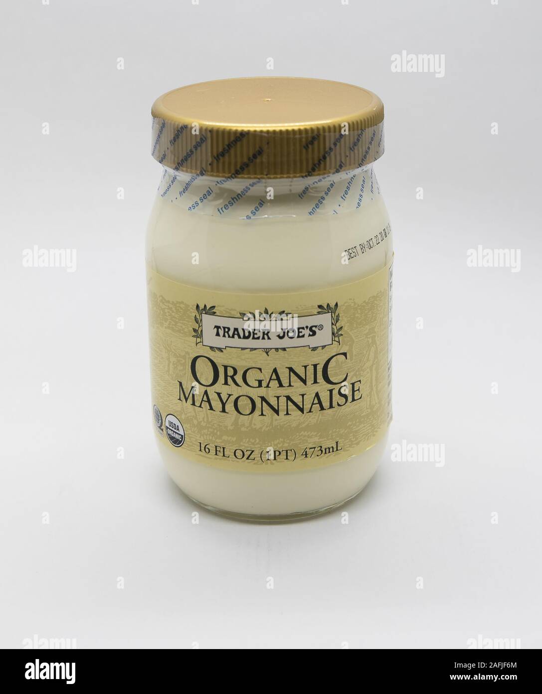 New York, 12/8/2019: Jar of Trader Joe's organic mayonnaise stands against white background. Stock Photo