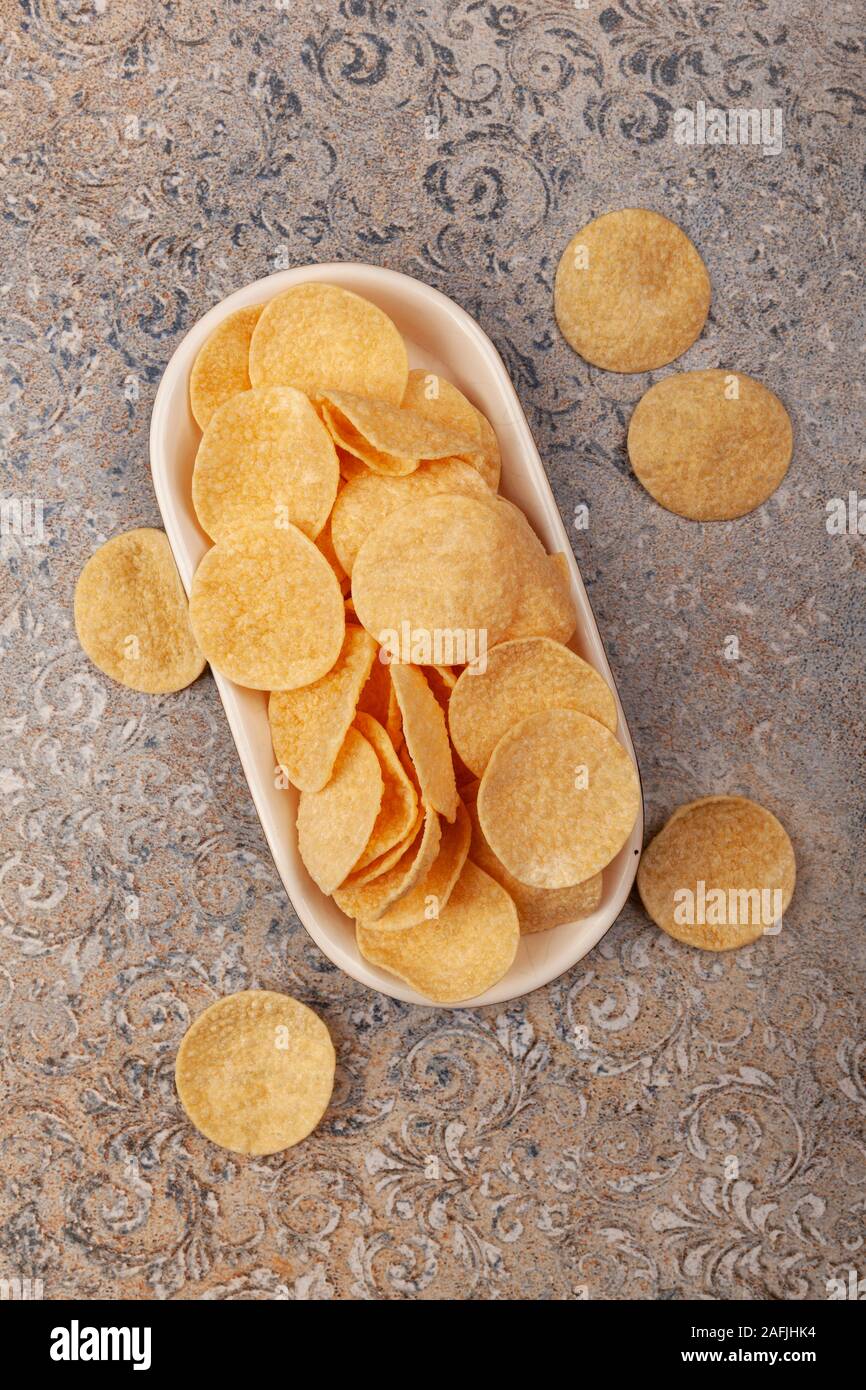 Organic hummus chickpea chips in a bowl from above Stock Photo Alamy