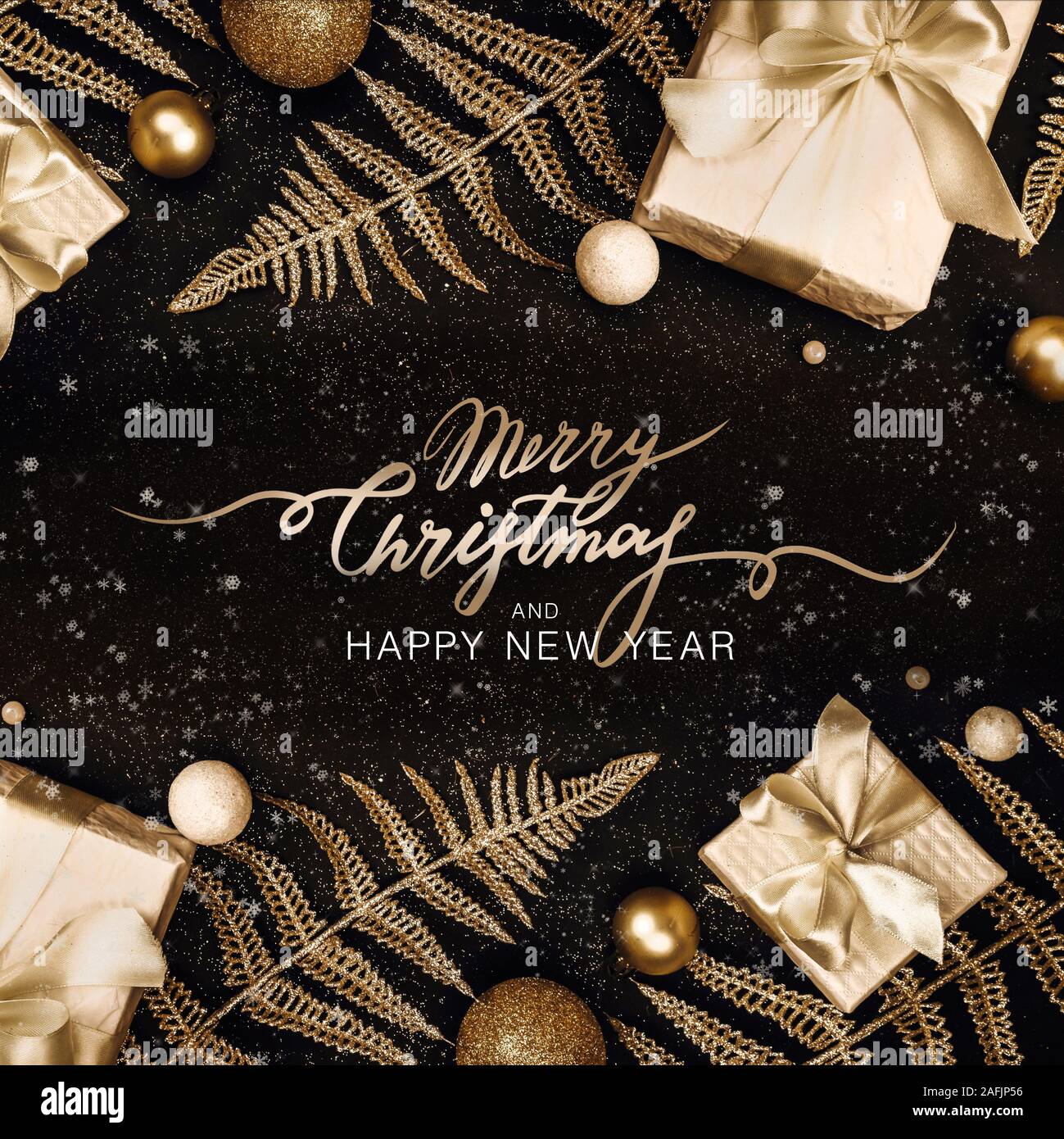 Beautiful holiday card, gifts, Christmas Lettering on black background ...