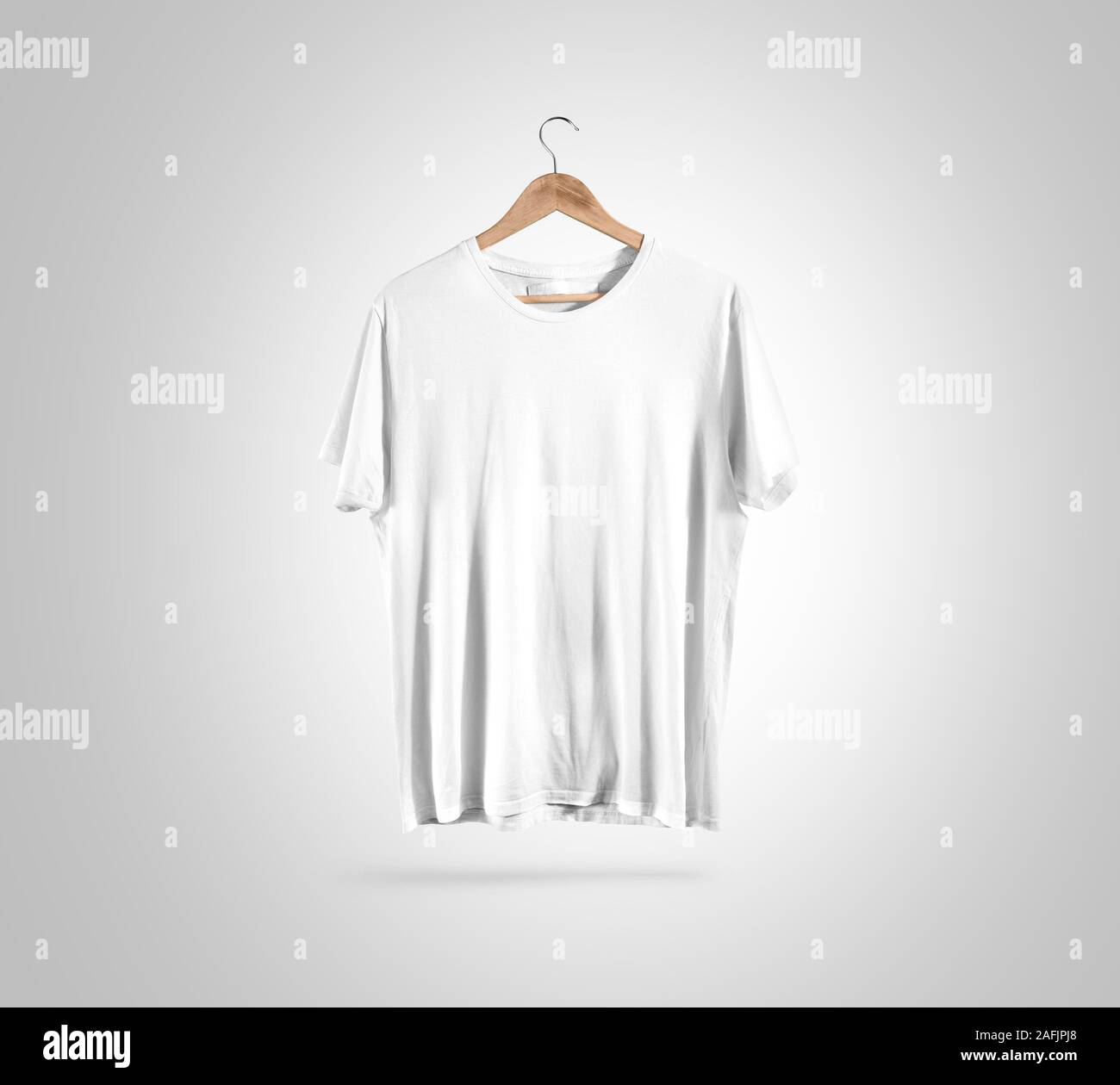 Blank white t-shirt on hanger, design mockup, clipping path Stock Photo ...