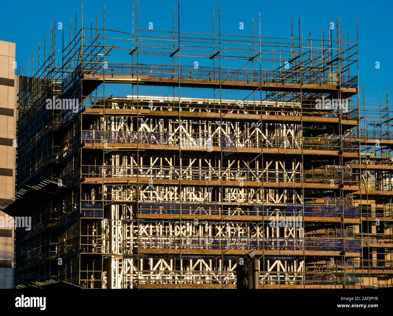 Scaffolding on apartment building construction by Cala Homes