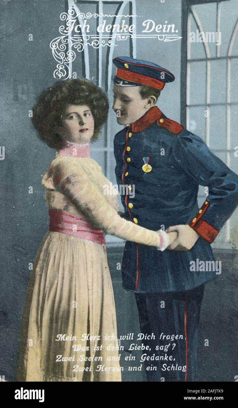 Postcard from the time of the First World War: Soldier and woman hand in hand, text: 'Ich denke Dein' (I am thinking of you). Stock Photo