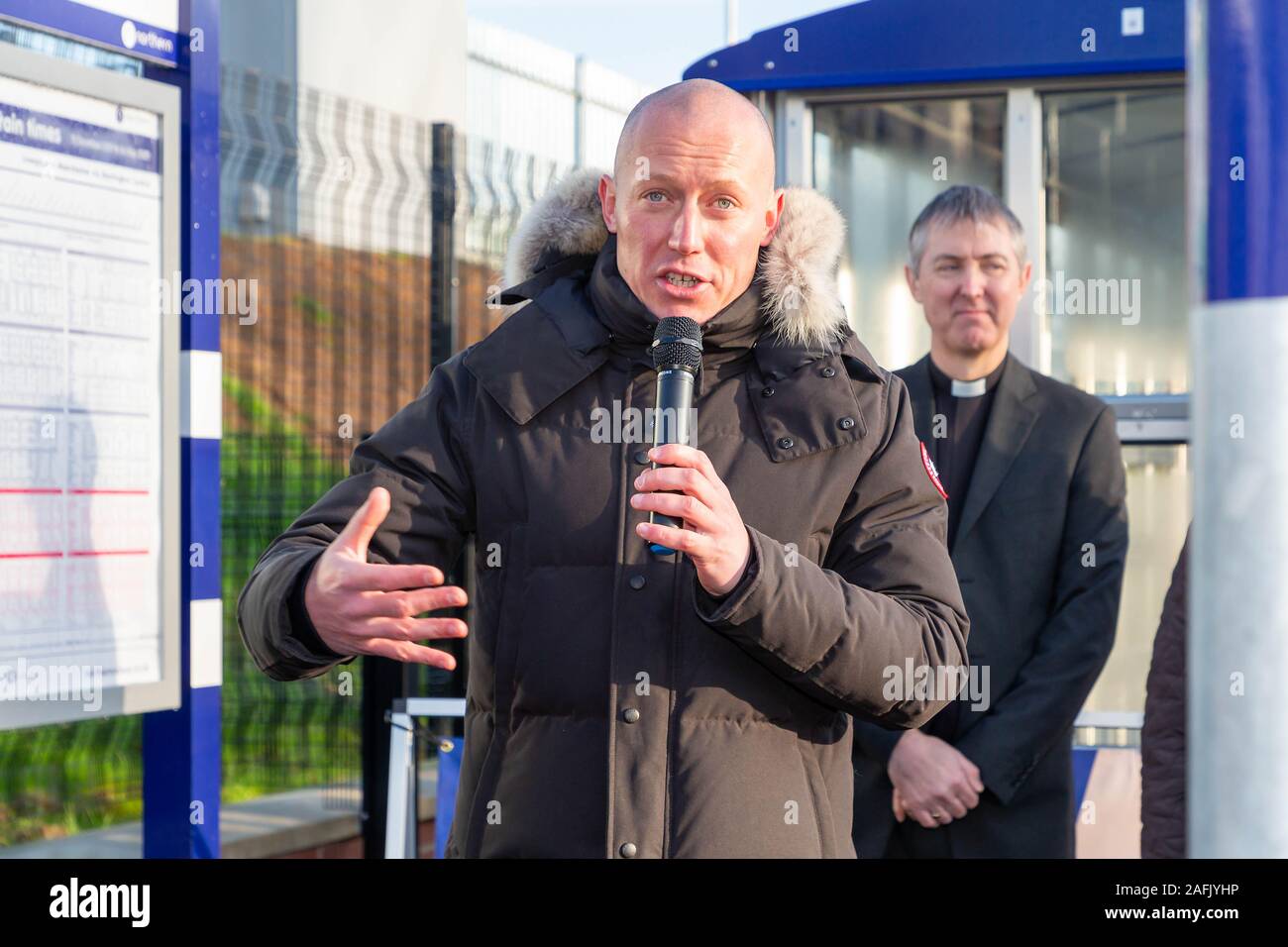 Warrington, Cheshire, UK. 16th Dec, 2019. Chris Jackson, Northern Rail's Regional Director for the West, addresses the guests at the official opening of Warrington West Railway Station on 16 December 2019 Credit: John Hopkins/Alamy Live News Stock Photo