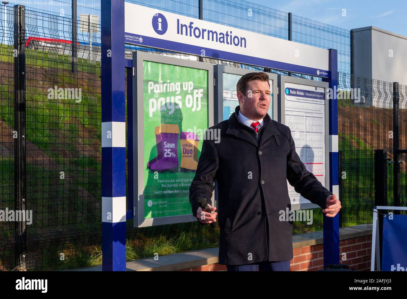 Warrington, Cheshire, UK. 16th Dec, 2019. Thomas Edgcumbe, Managing Director (UKCS North and Midlands) at Balfour Beatty plc, addresses the guests at the official opening of Warrington West Railway Station on 16 December 2019 Credit: John Hopkins/Alamy Live News Stock Photo