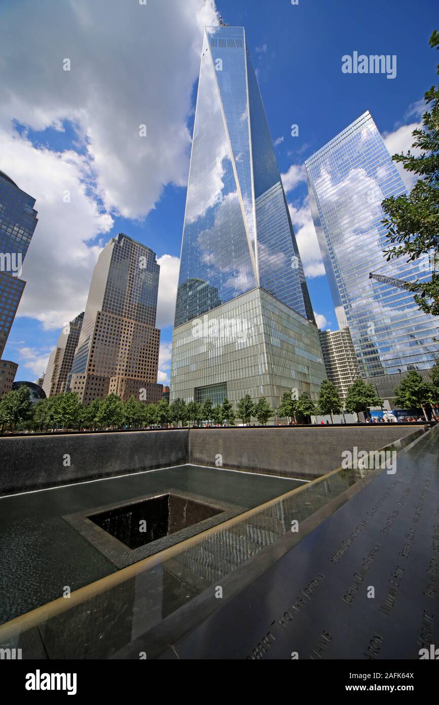 9/11 - 0911 - National September 11 Memorial North Tower Fountain,with One World Trade Center,Lower Manhattan,New York City, NY, USA Stock Photo