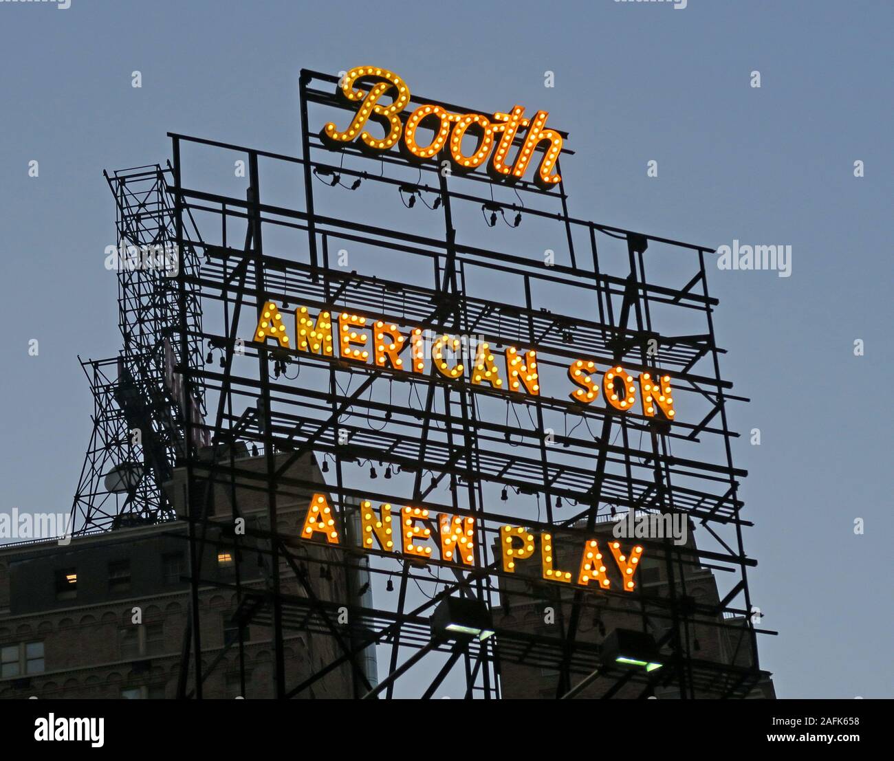 Neon sign on top of theatre in yellow, Booth , American Son , A New Broadway Play by Christopher Demos-Brown, New York City, NY, USA Stock Photo