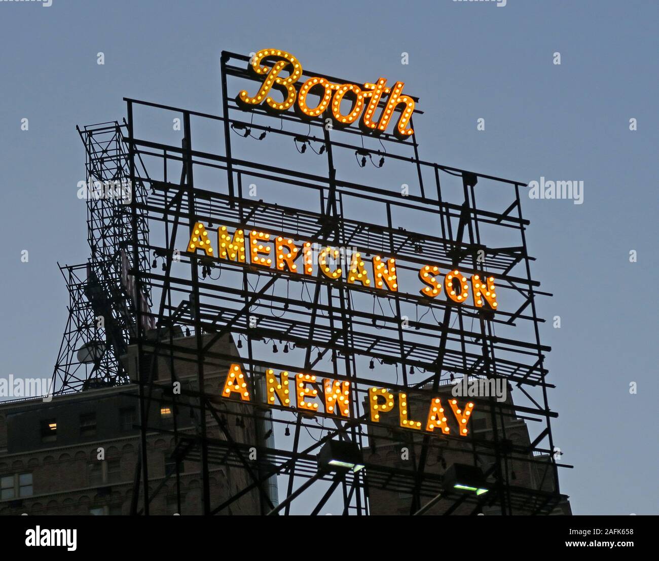 Neon sign on top of theatre in yellow, Booth , American Son , A New Broadway Play, New York City, NY, USA Stock Photo