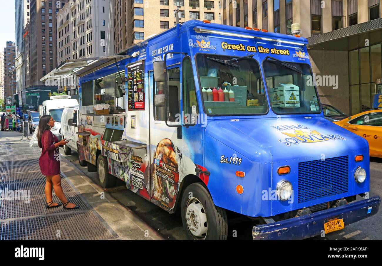 Greek on the street,fast food van,giros,King Souvlaki,with customer ordering,Manhattan street vendor,New York City, NYC,NY,United States Stock Photo