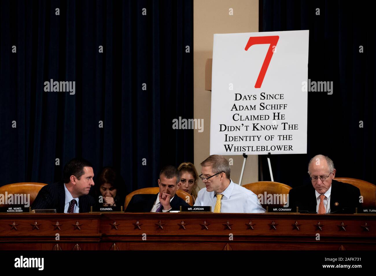 From left to right: United States Representative Devin Nunes (Republican of California), Ranking Member, US House Permanent Select Committee on Intelligence, Minority Counsel Stephen Castor, US House Permanent Select Committee on Intelligence, and US Representative Jim Jordan (Republican of Ohio) converse with each other as US Representative Mike Conaway (Republican of Texas) looks on during a US House Intelligence Committee impeachment inquiry hearing with Gordon Sondland, the U.S. ambassador to the European Union in Washington DC, on Wednesday November 20th, 2019. Credit: Anna Moneymaker/P Stock Photo