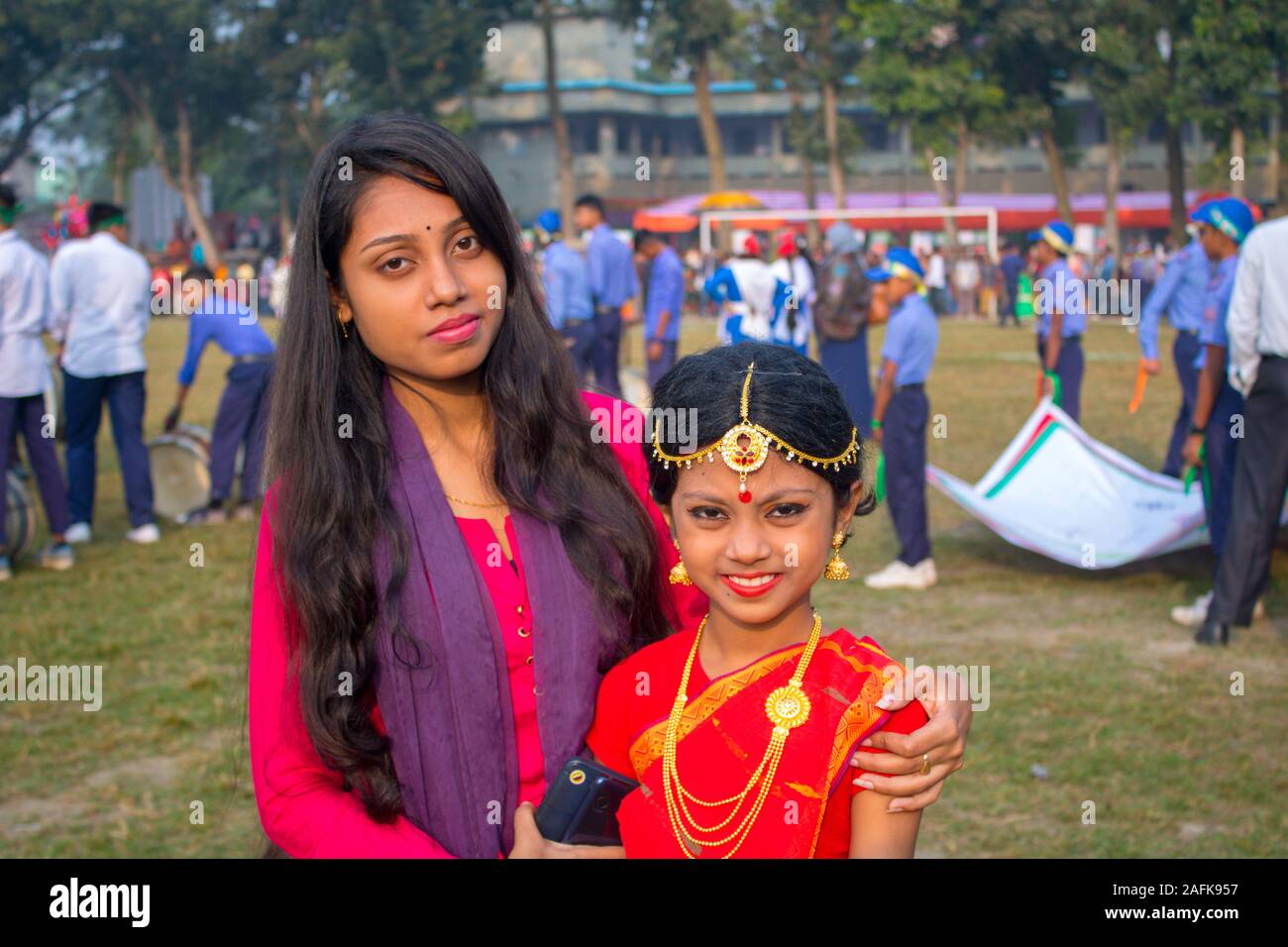 Traditionally Celebrating Victory Day Of Bangladesh Two Cheerful Sisters Posing For This Photo 0036