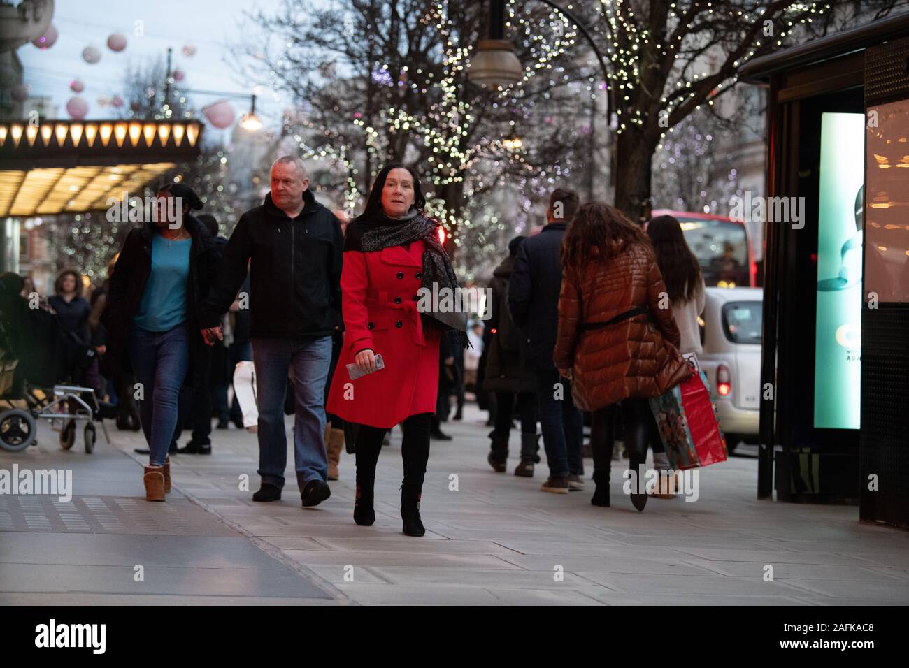 Christmas shoppers doing late Christmas shopping, outside Selfridges, London, UK Stock Photo
