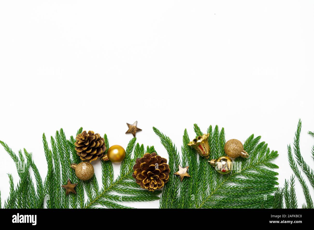 Christmas - Pine cones and branches White background Stock Photo - Alamy