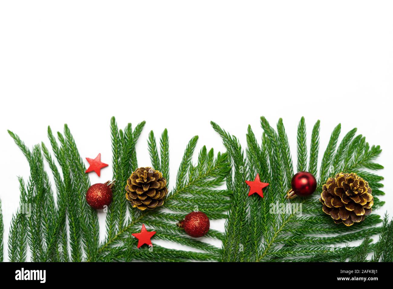 Christmas - Pine cones and branches White background Stock Photo - Alamy