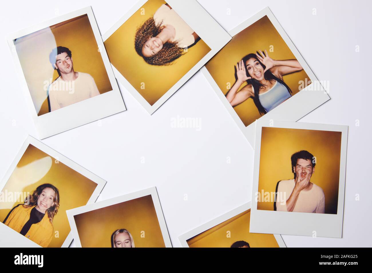 Instant Film Photos Of Young Men And Women For Modeling Casting In Studio On White Background Stock Photo