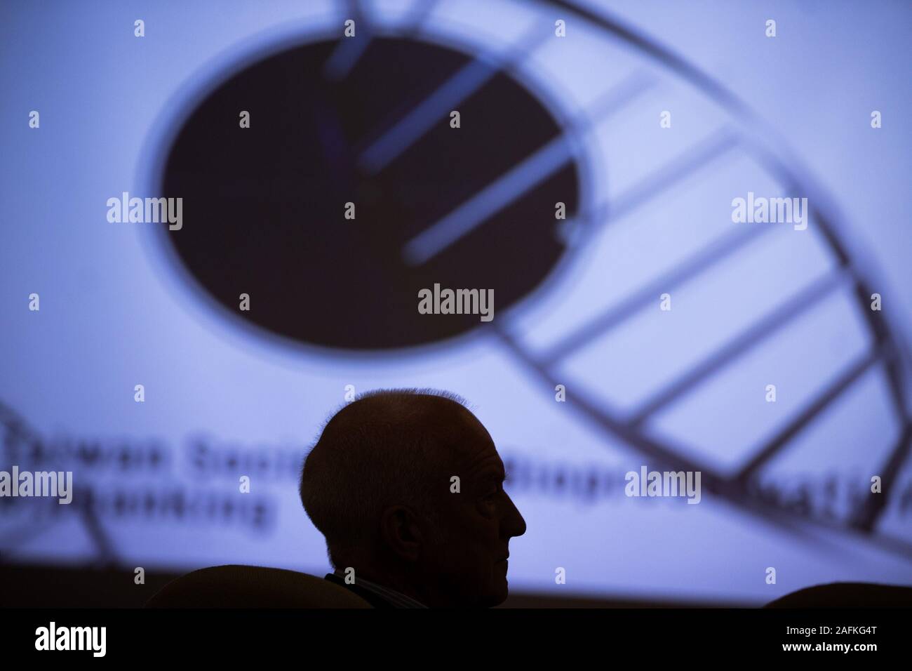 Taipei's Taiwan. 16th Dec, 2019. A man listens to an introduction of the development of Taiwan Biobank during an annual session of the Taiwan Society for Biopreservation and Biobanking in Taipei, southeast China's Taiwan, Dec. 16, 2019. Taiwan Biobank, founded in 2012, aims to expand its gene database to 200,000 individuals by 2024, its principal investigator Lee Te-chang said Monday.TO GO WITH 'Taiwan Biobank to expand gene database to 200,000 individuals by 2024' Credit: Jin Liwang/Xinhua/Alamy Live News Stock Photo