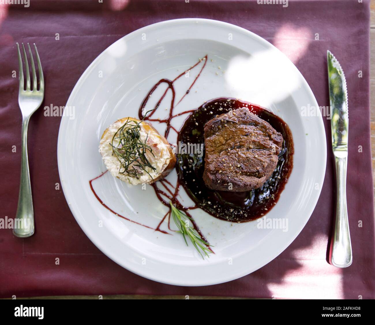 A main course of filet of beef at a spring time lunch at the restaurant of Tupungato Divino in Tupungato, Mendoza Province, Argentina. Stock Photo